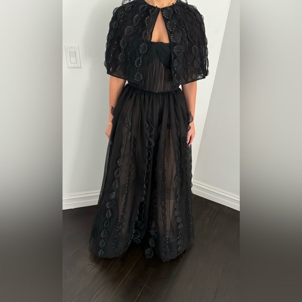 J Mendel Gown